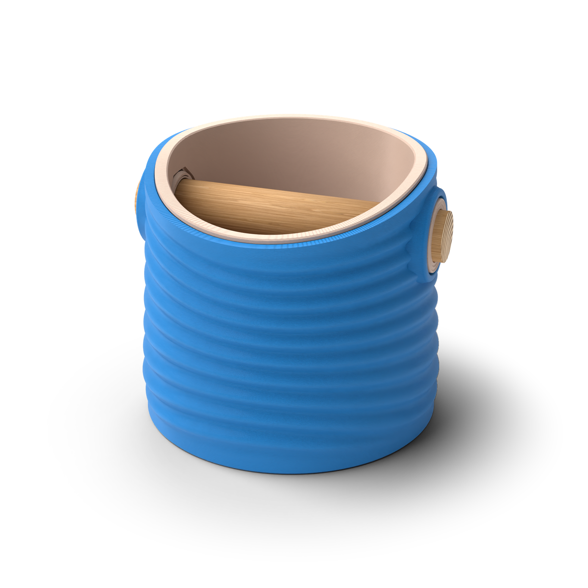 Ripple tapered round espresso knock box with a Marine Blue rippled shell, a lift-out Latte Brown inner bin and a solid oak knock bar with Knock Caps