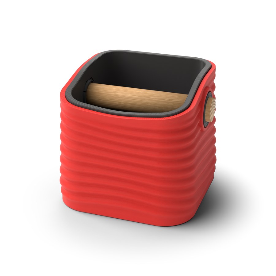 Ripple tapered square espresso knock box with a Scarlet Red rippled shell, a lift-out Charcoal inner bin and a solid oak knock bar with Knock Caps