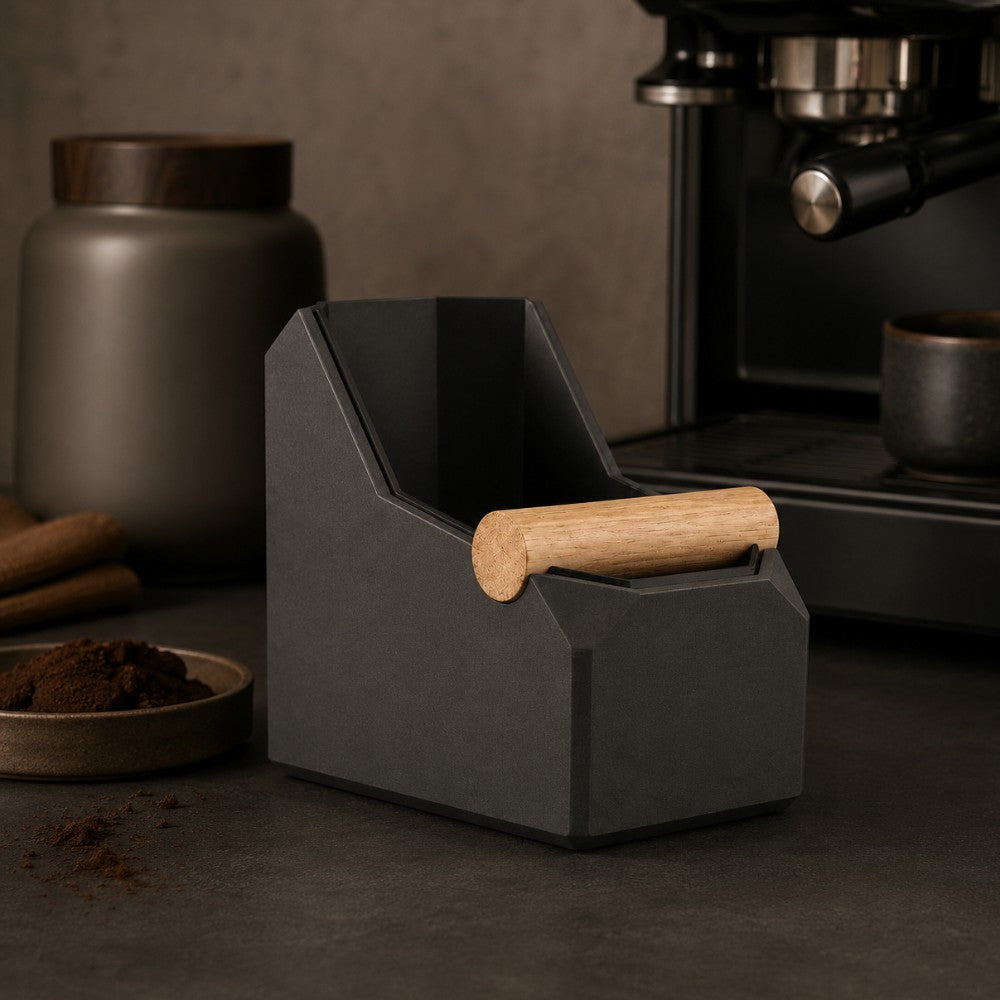 Charcoal KNOCDIC knock box with wooden knock bar in a dark home espresso station