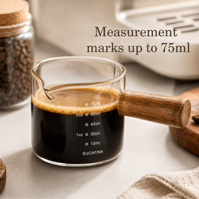 Close up of espresso measuring cup markings up to 75ml