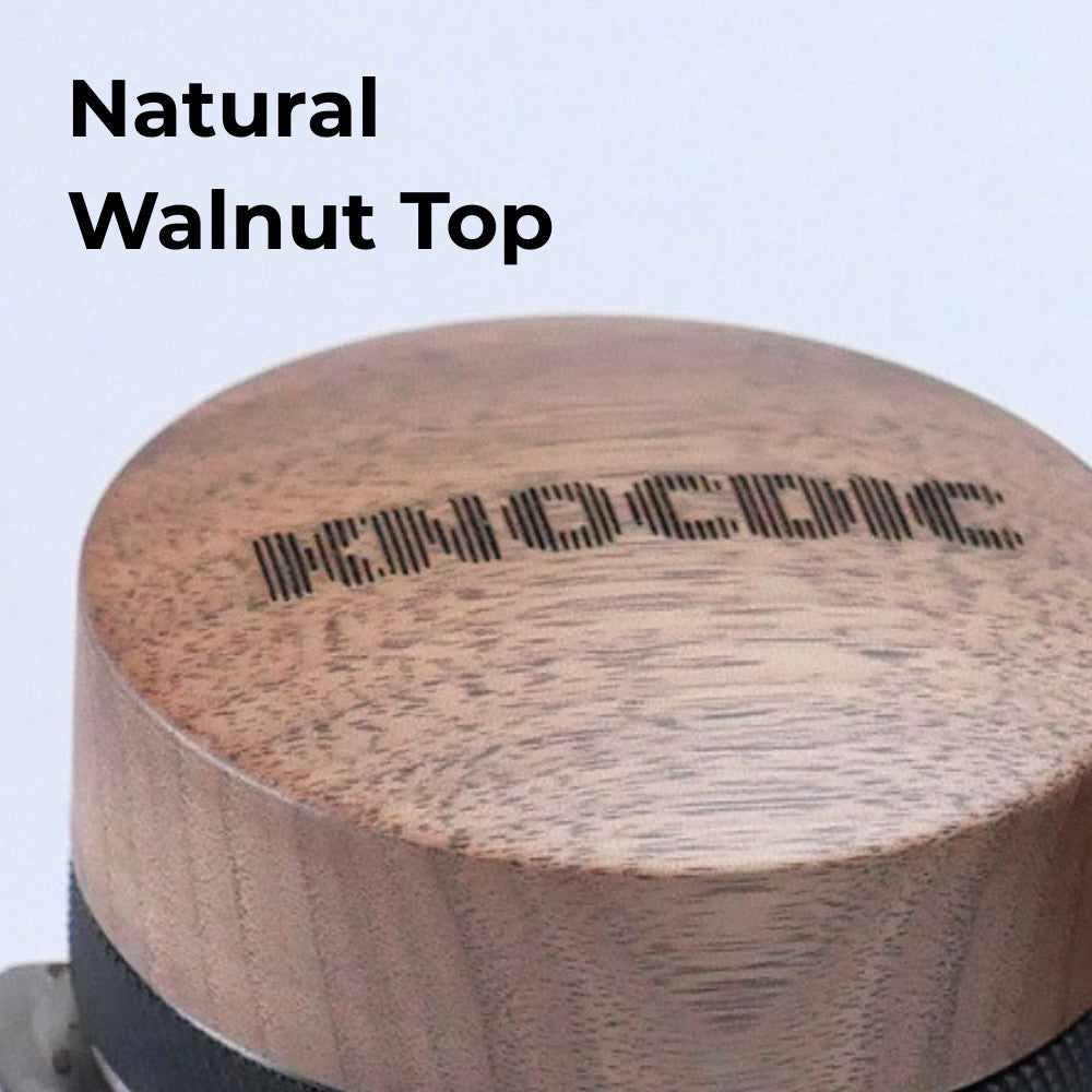 Close-up of natural walnut wood top on adjustable espresso distribution tool