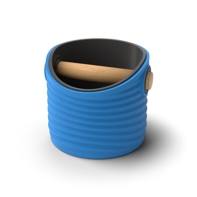 Ripple round espresso knock box with a Marine Blue rippled shell, a lift-out Charcoal inner bin and a solid oak knock bar with Knock Caps