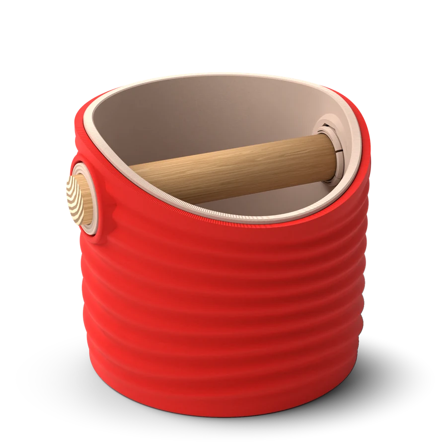 Medium: Ripple round espresso knock box with a Scarlet Red rippled shell, a lift-out Latte Brown inner bin and a solid oak knock bar with Knock Caps