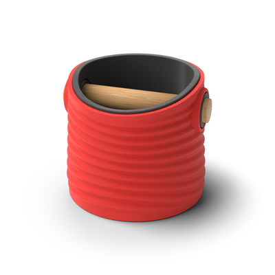 Ripple tapered round espresso knock box with a Scarlet Red rippled shell, a lift-out Charcoal inner bin and a solid oak knock bar with Knock Caps