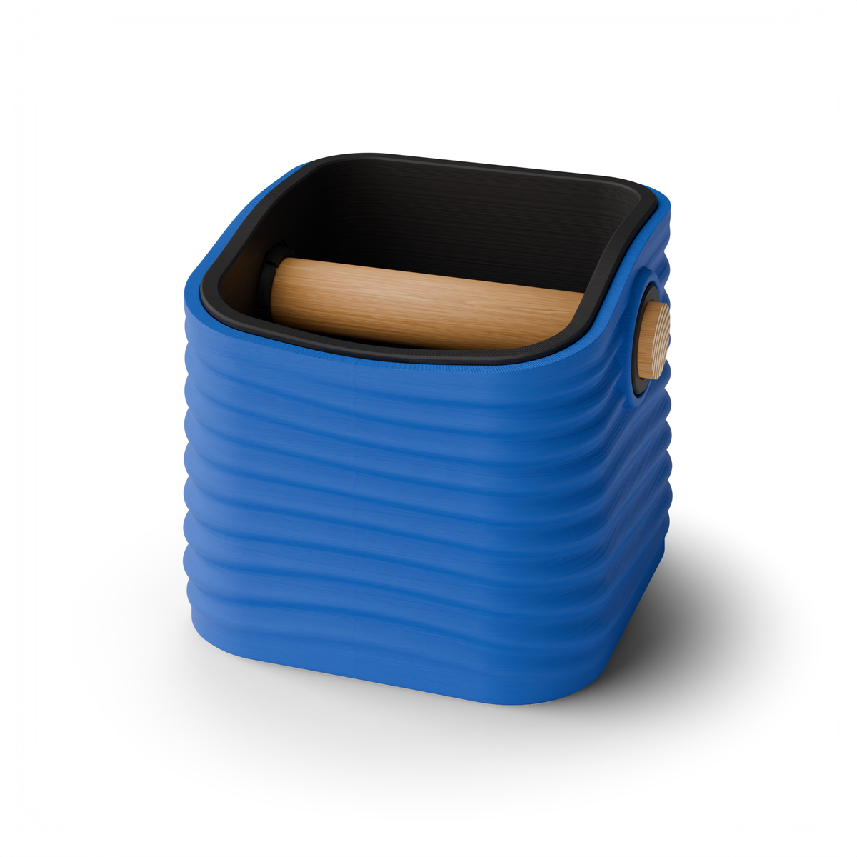 Ripple tapered square espresso knock box with a Marine Blue rippled shell, a lift-out Charcoal inner bin and a solid oak knock bar with Knock Caps