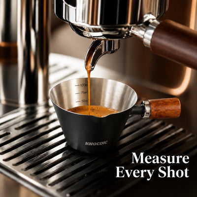 Espresso measuring cup showing 50ml 75ml and 100ml marks