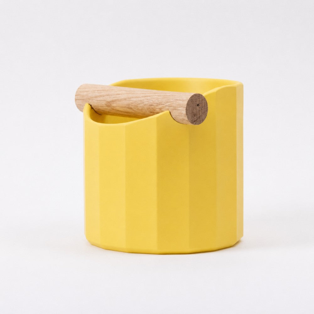 Facet Geometric Espresso Knock Box with real wood bar in matte yellow