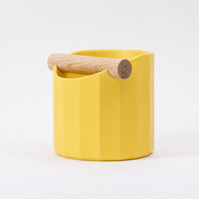 Facet Geometric Espresso Knock Box with real wood bar in matte yellow
