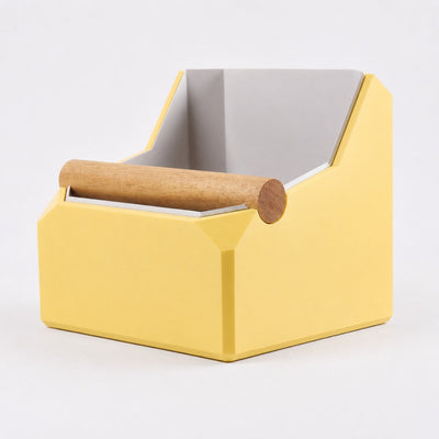 KNOCDIC Large Square espresso knock box in matte pastel yellow with a contrasting ash grey inner liner and real oak wood bar.