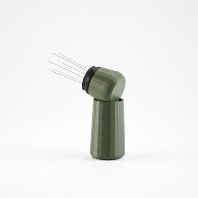 KNOCDIC olive green espresso WDT tool resting upright inside its matching custom 3D printed standing holder.